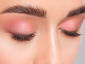 Closeup shot of closed eyes of a woman